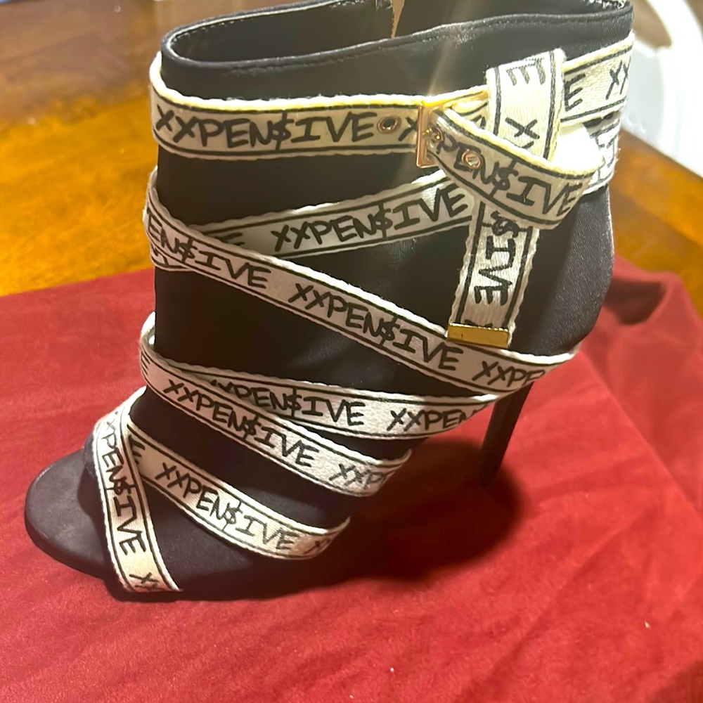 Black, white “expensive” labeled booties, women’s size 11US